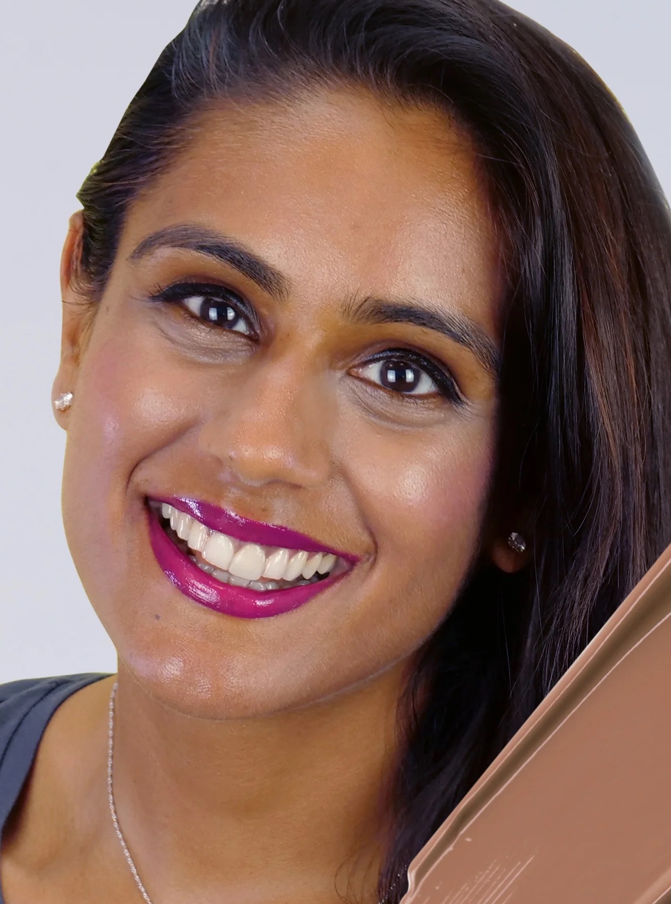A woman wearing Juice Beauty foundation.
