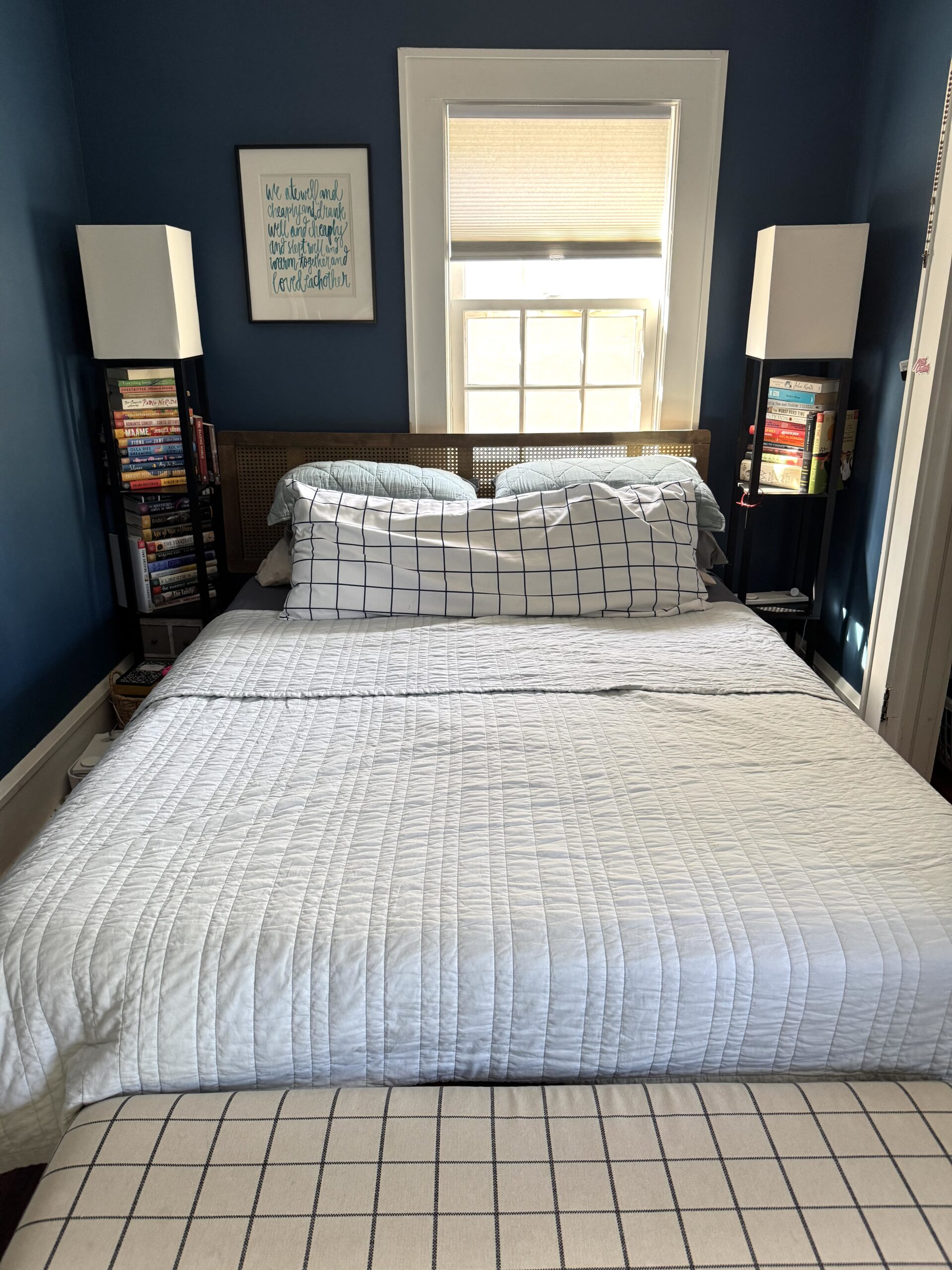 A Quince quilt on a bed. 