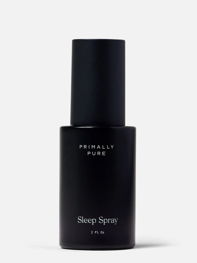 A black bottle labeled "Primally Pure Sleep Spray, 2 fl oz" against a plain light background.
