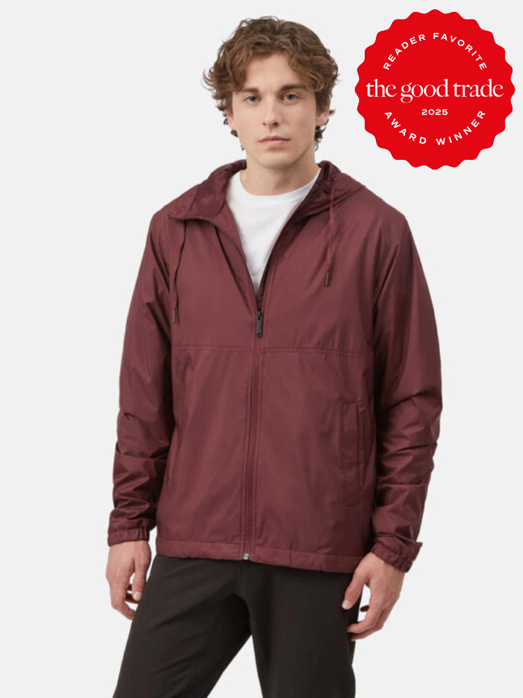 Person wearing a maroon zip-up jacket and black pants. Red badge on the top right reads "Reader Favorite, The Good Trade, Award Winner, 2025.