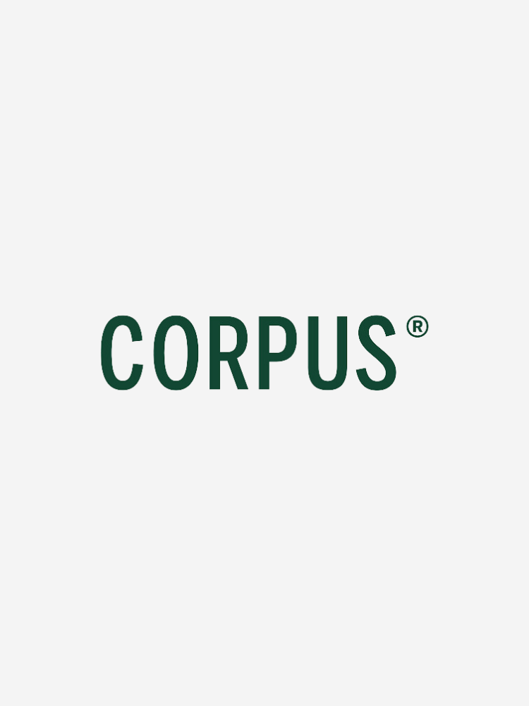 The image shows the word "CORPUS" in bold, dark green, uppercase letters, centered on a plain light gray background, with a registered trademark symbol in superscript.