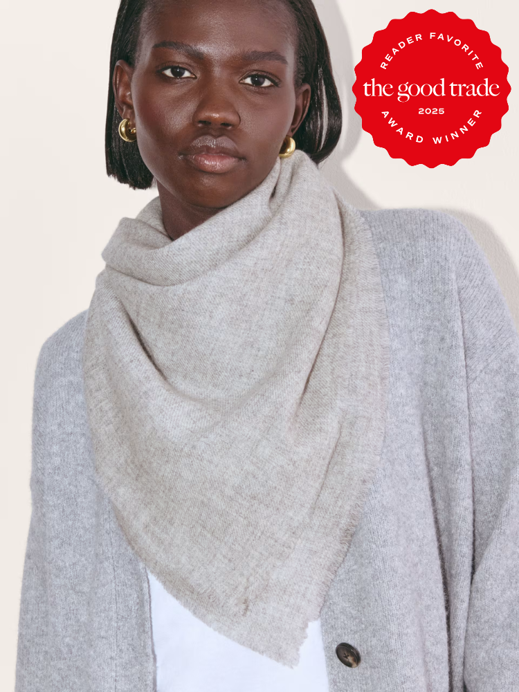 Person wearing a light grey scarf and cardigan, with a red circular "Reader Favorite the good trade 2023 Award Winner" badge in the top right corner.